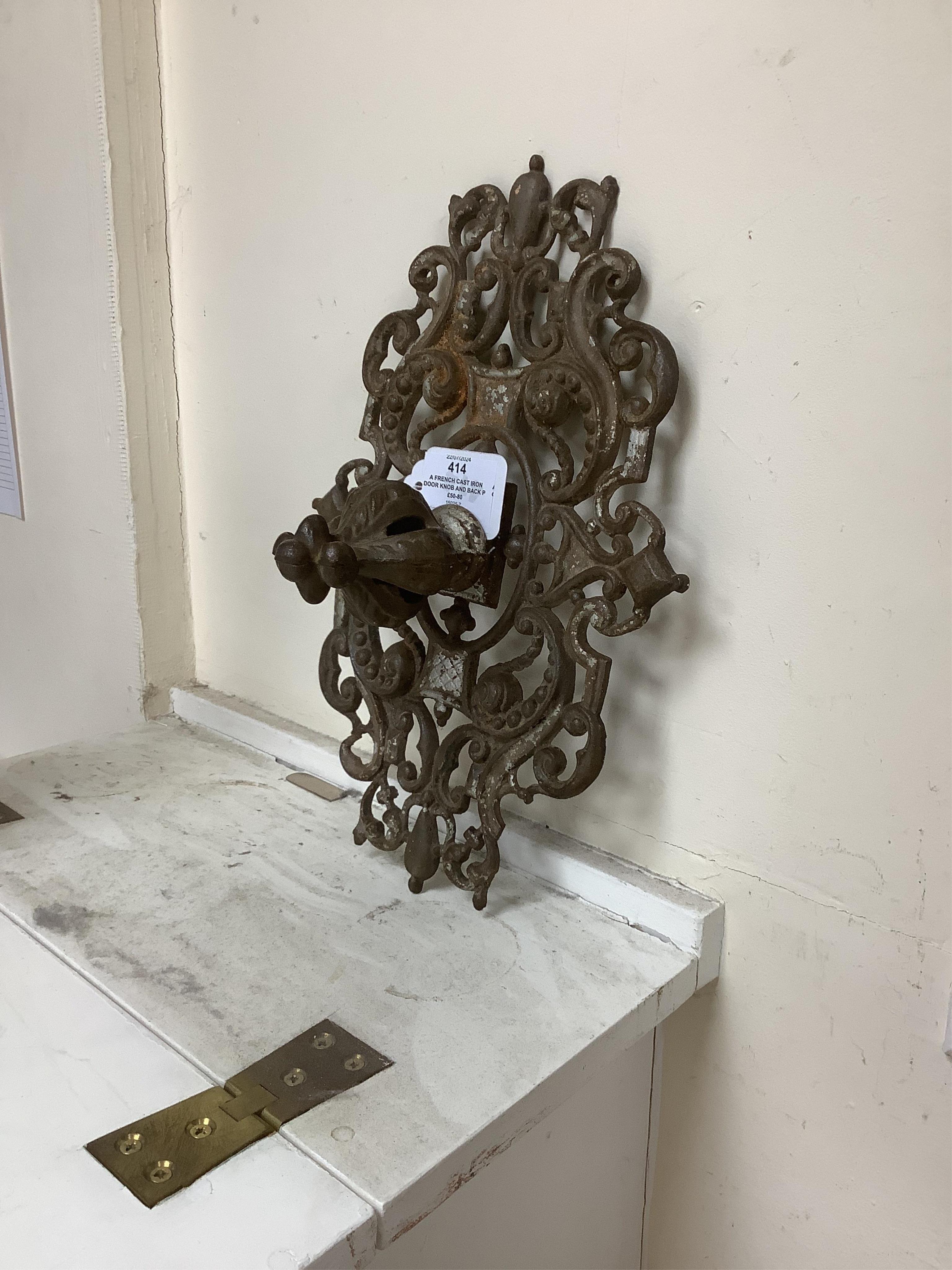 A French cast iron door knob and back plate, possibly made for the Moroccan market. Condition - fair
